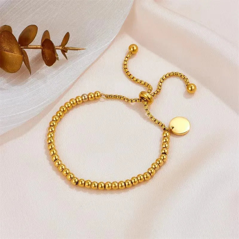 ANENJERY 316L Stainless Small Ball Beads Pull Out Bracelet for Women Simple Fashion Circular Tag Bracelet Daily Party Jewelry