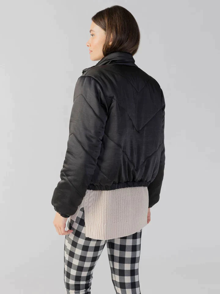 Quilted jacket in black.