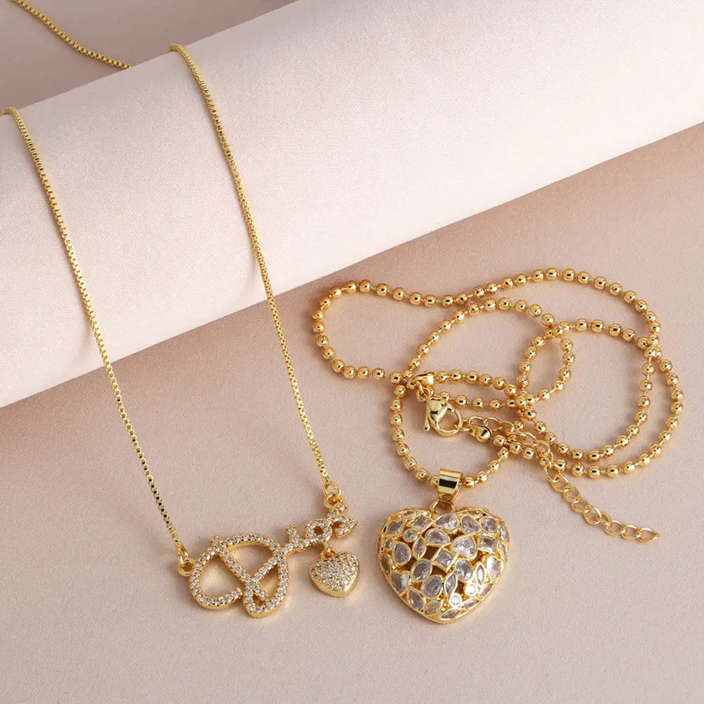 FLOLA Luxury Cz Crystal Heart Necklaces for Women Copper Gold Plated Letter Necklaces Dainty Jewelry Party Gifts nkeb857